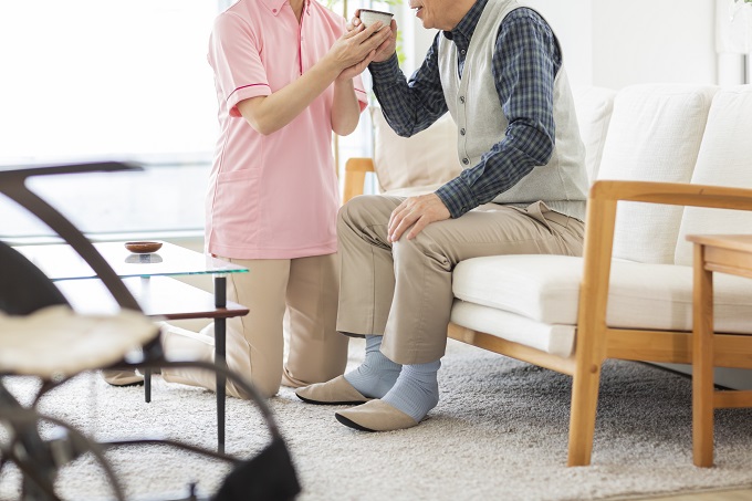 介護する人